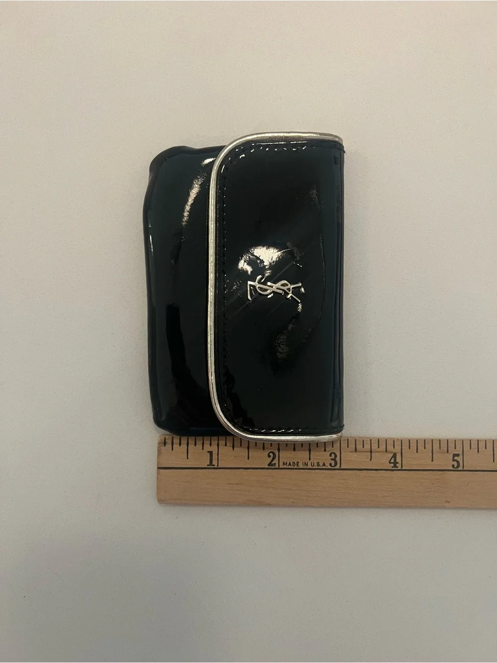 YSL beauty Black glossy pouch.
